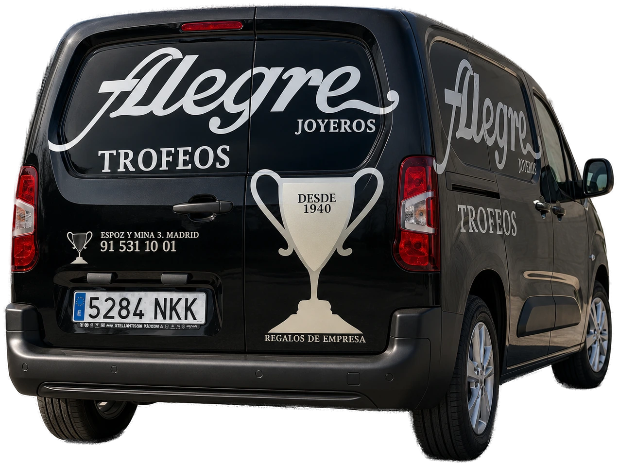 Furgoneta negra rotulada para Alegre Trofeos y Joyeros, con el logotipo, la copa de trofeo y los datos de contacto.